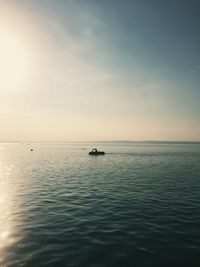 Scenic view of calm sea against sky