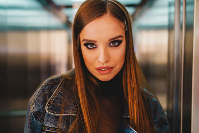 Portrait of beautiful woman with blond long hair