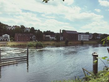 River by city against sky