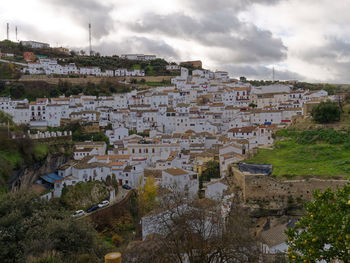 High angle view of old town against sky