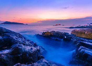 Scenic view of sea against sky during sunset