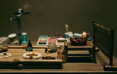 Close-up of objects for sale in a wooden and ceramic items shop in the greater bay area