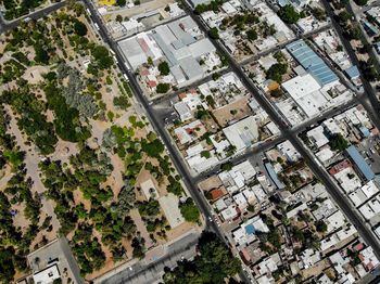 High angle view of street amidst buildings in city