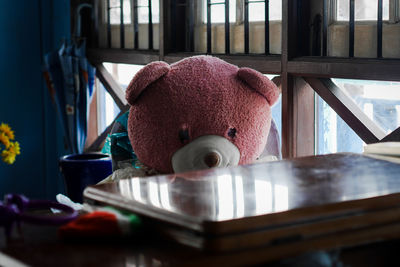 Close-up of stuffed toy on table at home