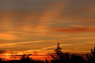 Scenic view of dramatic sky during sunset