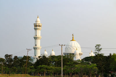 Low angle view of mosque against clear sky