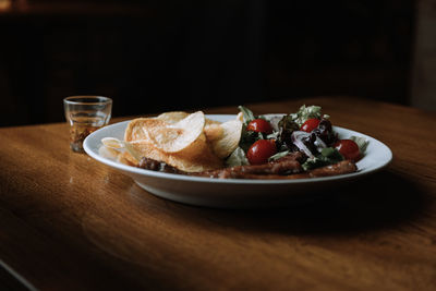 Close-up of breakfast served on table