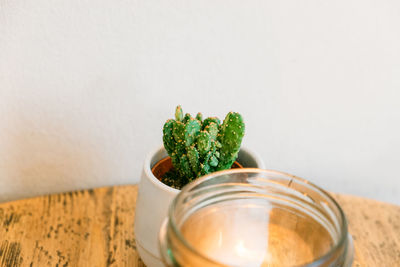 Close-up of glass jar on table