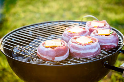 High angle view of meat on barbecue grill