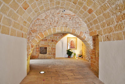 A street in the historic center of specchia, a medieval town in the puglia region, italy.