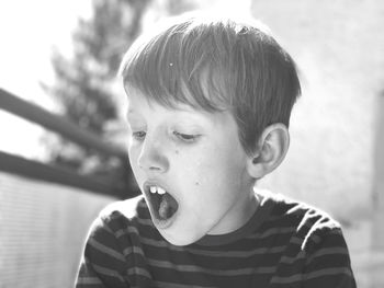 Close-up portrait of boy looking away