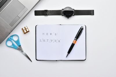 High angle view of pen on table against white background