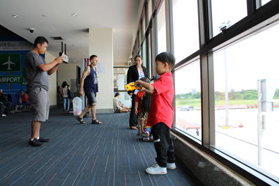 People standing in corridor