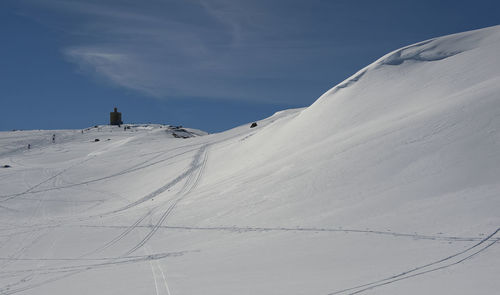 Scenic view of snow against sky