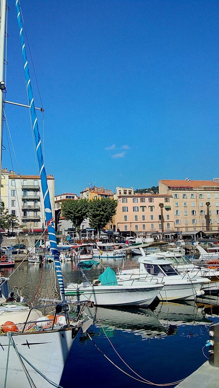 sky, nautical vessel, water, transportation, building exterior, built structure, architecture, moored, blue, mode of transportation, nature, day, no people, clear sky, harbor, building, city, sailboat, copy space, outdoors, yacht, canal, marina, port