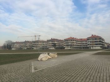 Built structure against cloudy sky