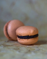 Close-up of chocolate macaron on table