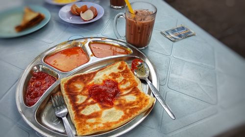 High angle view of breakfast served on table