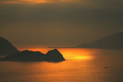 Scenic view of mountains at sunset