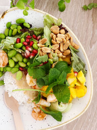 Healthy high fiber, complete meal of the day, high angle view of fruits in plate on table