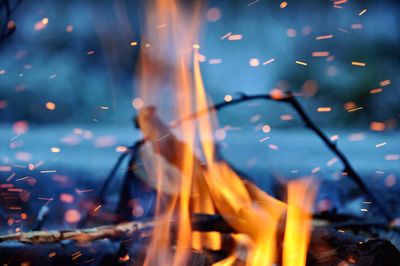 Close-up of illuminated fire in water at night