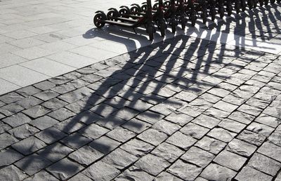 High angle view of bicycle on cobblestone street