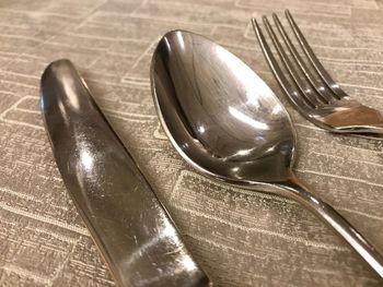 Close-up of spoon on table