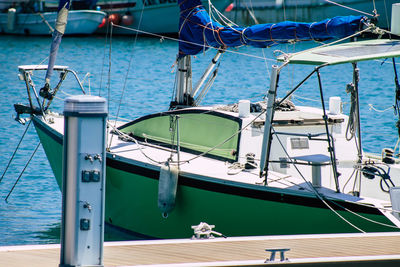 View of sailboats moored in sea