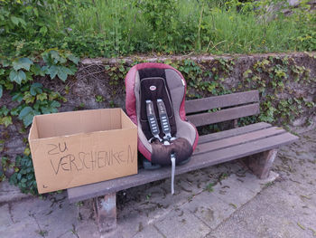 High angle view of empty bench in park