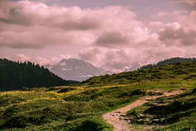 Scenic view of landscape against sky during sunset