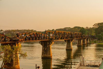Bridge over river against clear sky