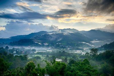 Scenic view of mountains against sky during sunset