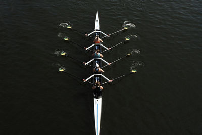 High angle view of people on boat in lake