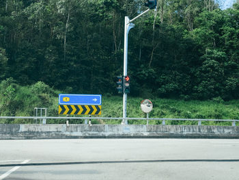 Information sign by road