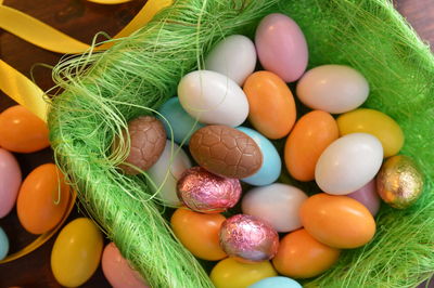 High angle view of multi colored eggs