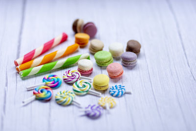 High angle view of multi colored candies on table