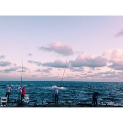 Scenic view of sea against cloudy sky