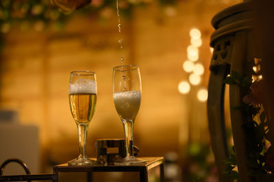 Close-up of wineglass on table