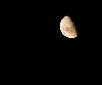 Low angle view of moon in sky