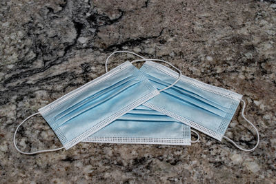 High angle view of deck chairs on sand