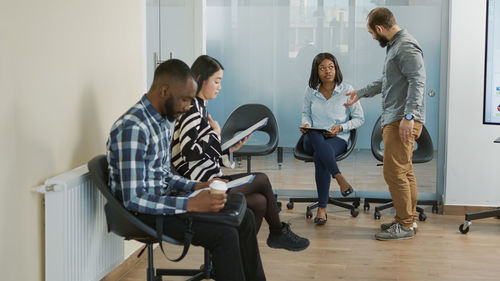 Business colleagues working at office