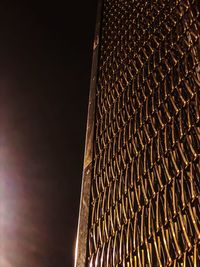 Low angle view of illuminated building roof