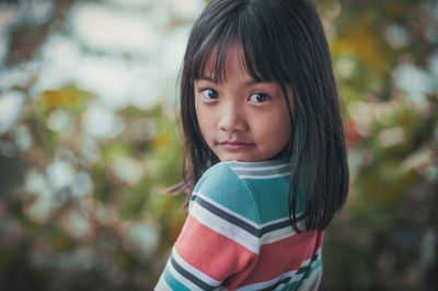 A little girl posing for the camera