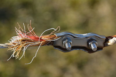 Close-up of rope attached to metal equipment