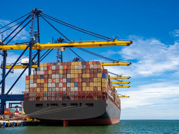 The container vessel during discharging at an industrial port .