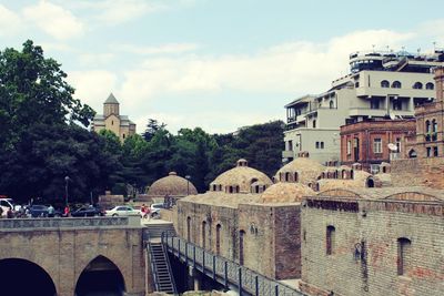 Panoramic view of buildings and houses against sky