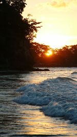 Scenic view of sea against sky during sunset