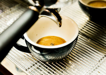 High angle view of coffee cup on table