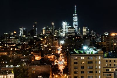 Illuminated one world trade center in city at night