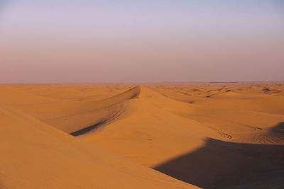 Scenic view of desert against sky